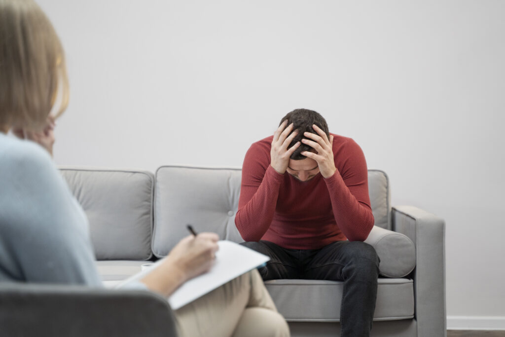 person suffering from ptsd psychologist