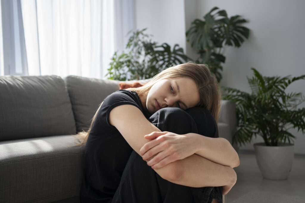 sad young woman home